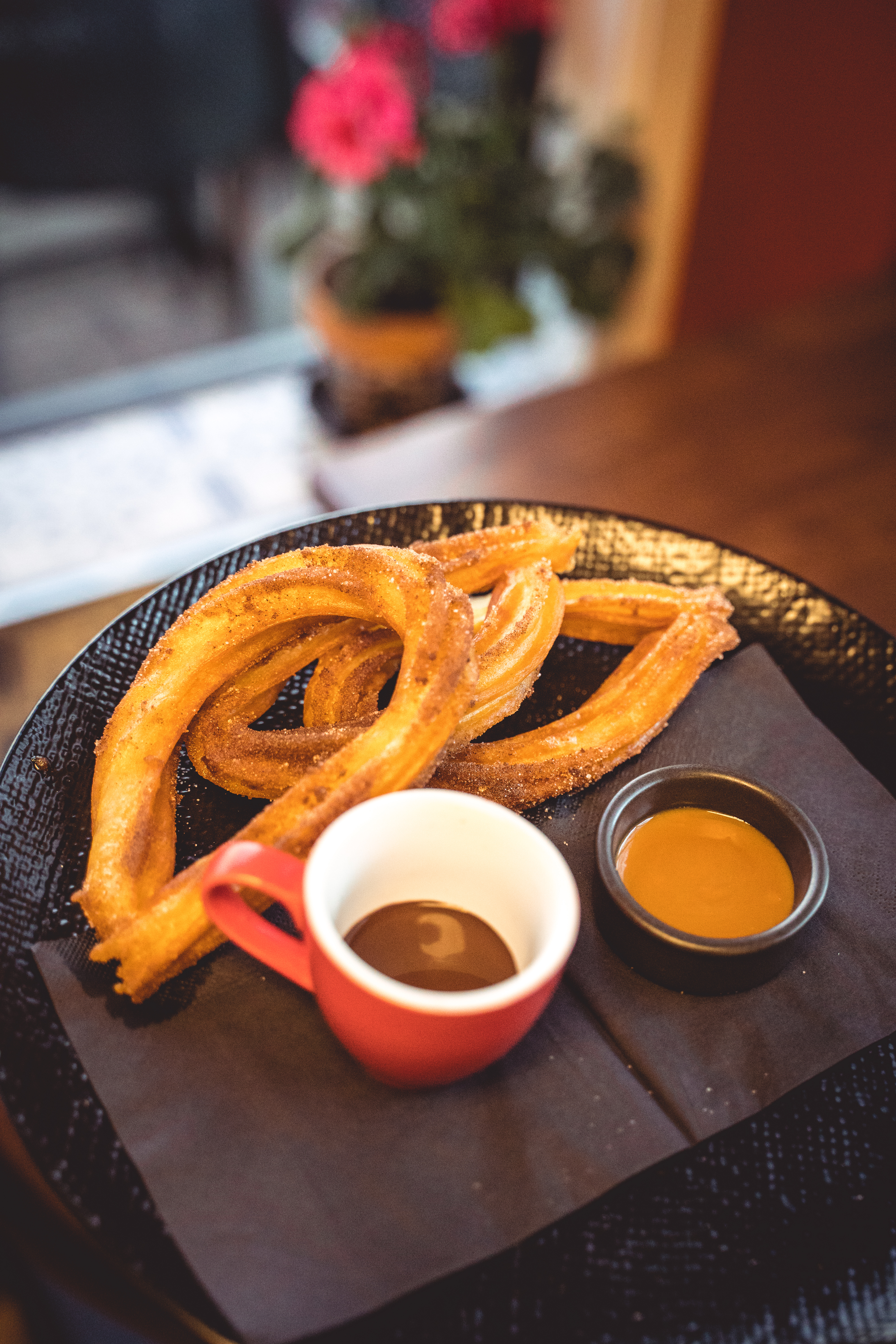 Three Sugar & Cinnamon Dusted Churros dipped in Hot Chocolate Sauce